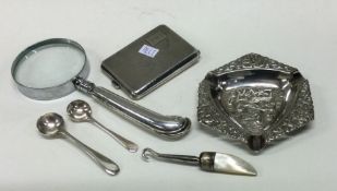 A silver match case together with cruet spoons etc