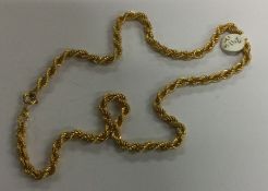 A 9 carat rope twist necklace. Approx. 8.5 grams.