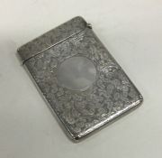 An attractive scroll decorated card case. Birmingh