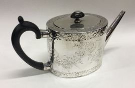 An 18th Century Georgian silver teapot with lift-o