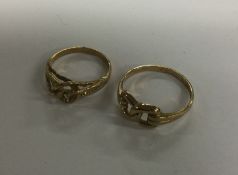 Two 9 carat keeper rings. Approx. 4.3 grams. Est.