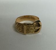 An 18 carat buckle ring. Approx. 4.1 grams. Est. £