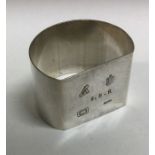 GUERNSEY: A silver napkin ring. By Bruce Russell.
