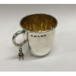 A good child's silver christening mug mounted with