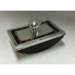 A good quality silver and tortoiseshell blotter. B