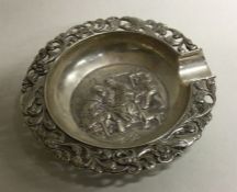 A Dutch silver tray with embossed decoration. Appr