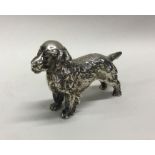 A good silver figure of a dog. London 1976. By SS.