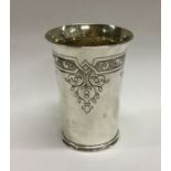 A Charles II style silver beaker with engraved dec