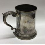 A heavy Georgian silver mug. London by W. S. Appro