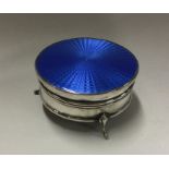 A silver and blue enamelled jewellery box. Birming