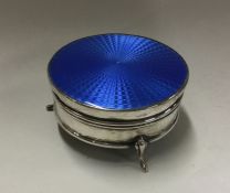 A silver and blue enamelled jewellery box. Birming