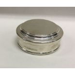 A heavy silver cuff box with pull-off lid. By Will