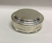 A heavy silver cuff box with pull-off lid. By Will