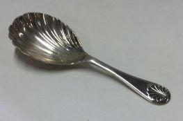A silver fluted caddy spoon. Birmingham. By CR. Ap