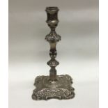 A large 18th Century silver cast candlestick. Lond