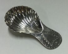 An 18th Century Georgian silver caddy spoon with f