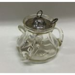 An Arts & Crafts glass preserve jar with silver li