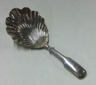 A George III fluted silver caddy spoon. Birmingham