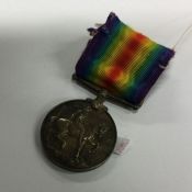 A WW1 war medal. Inscribed "130070 DVR. J. BOLT" E