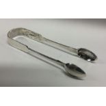 A pair of Georgian style silver sugar tongs. Londo