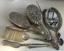 A Chinese silver brush together with a mirror etc.
