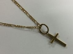 A 9 carat necklace with matching cross. Approx. 6.