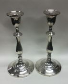 A pair of 18th Century George III silver candlesti