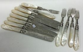 A set of six (plus six) silver bladed dessert kniv