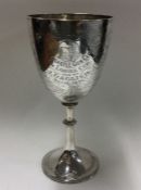 OF SHOOTING INTEREST: An engraved silver goblet. S