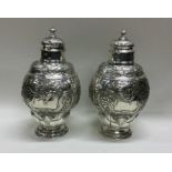 An 18th Century pair of silver tea caddies. London
