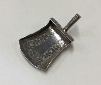 A Georgian silver caddy spoon. London. by WP. Appr