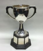 A good plain silver trophy cup on pedestal base. B