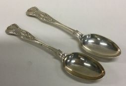 A pair of Kings' pattern silver dessert spoons. Lo