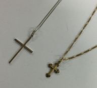 Two 9 carat crucifix's on fine link chains. Appro