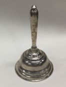 A Chinese export silver table bell. Marked to inte