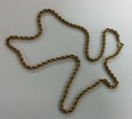 A 9 carat rope twist chain. Approx. 4.6 grams. Est