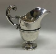 An Edwardian silver cream jug. Sheffield. By JD&WD
