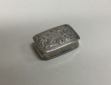 A William IV silver vinaigrette with engraved deco