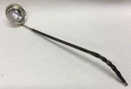 A good Georgian silver toddy ladle with whalebone