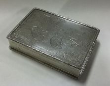 A heavy silver snuff box decorated with birds. App