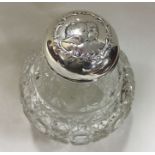 A large silver mounted glass scent bottle with che