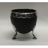 An 18th Century silver mounted coconut cup engrave