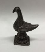 A heavy cast silver figure of a bird. Approx. 76 g