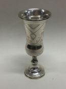 A silver Kiddush cup of typical form. Approx. 28 g