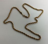 A 9 carat rope twist chain. Approx. 3 grams. Est.
