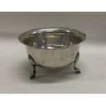 A heavy silver sugar bowl with card cut rim. Londo