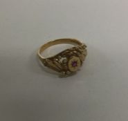 A ruby mounted gypsy set ring. Approx. 3 grams. Es