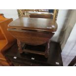 (2027) Small oval drop leaf table