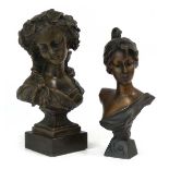 A brown-patinated bronze bust modelled as a Classical lady, on a marble plinth, h.