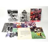 A group of sporting ephemera including signed American Football stills,